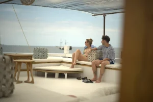 The sun deck of a liveaboard phinisi at anchor