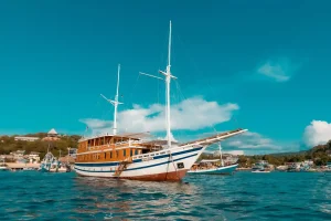 A liveaboard phinisi at anchor inside Komodo National Park