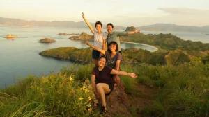 Visitors watching sunrise from the ridge of Padar Island