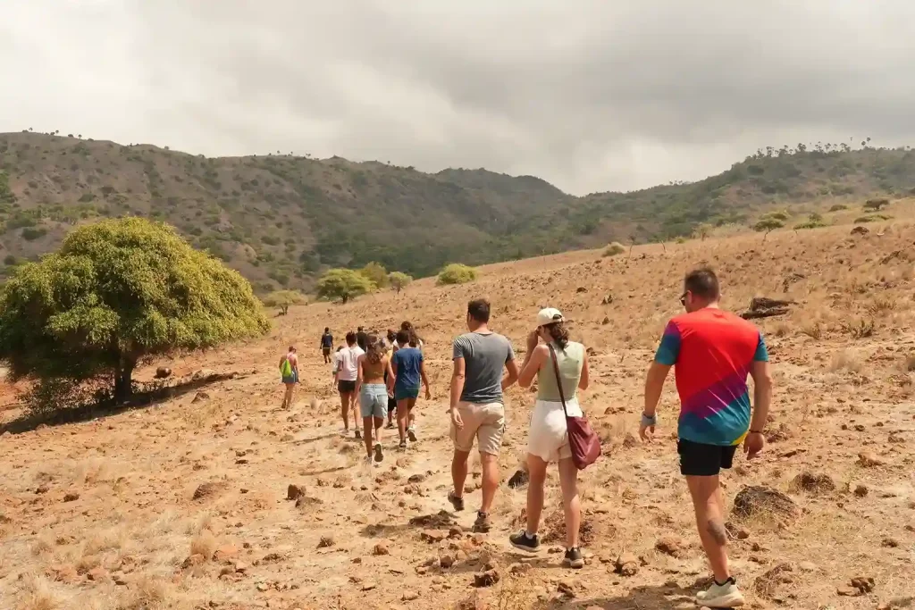 Travellers hiking a Komodo Island ridge trail