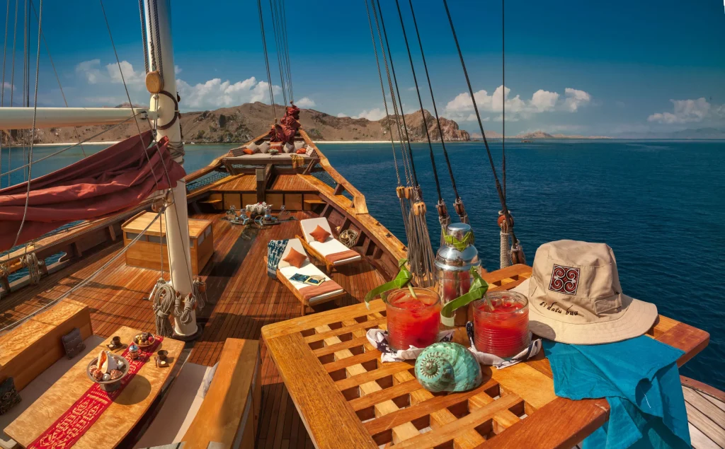 Sunset on the open deck of a phinisi yacht